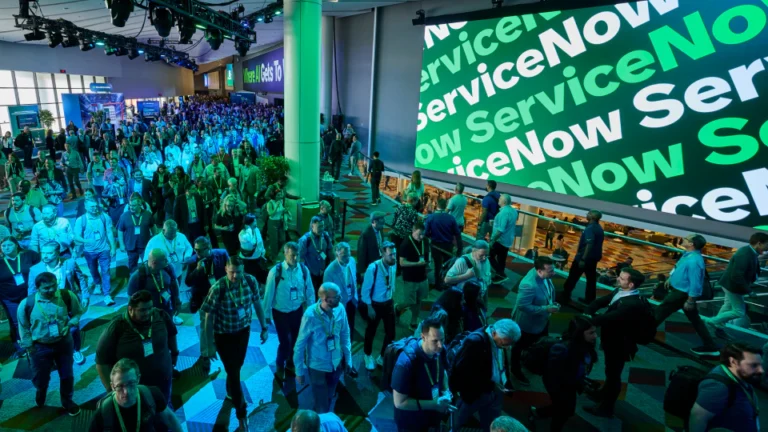 Stack of finance and investment books for wealth-building in 2026.