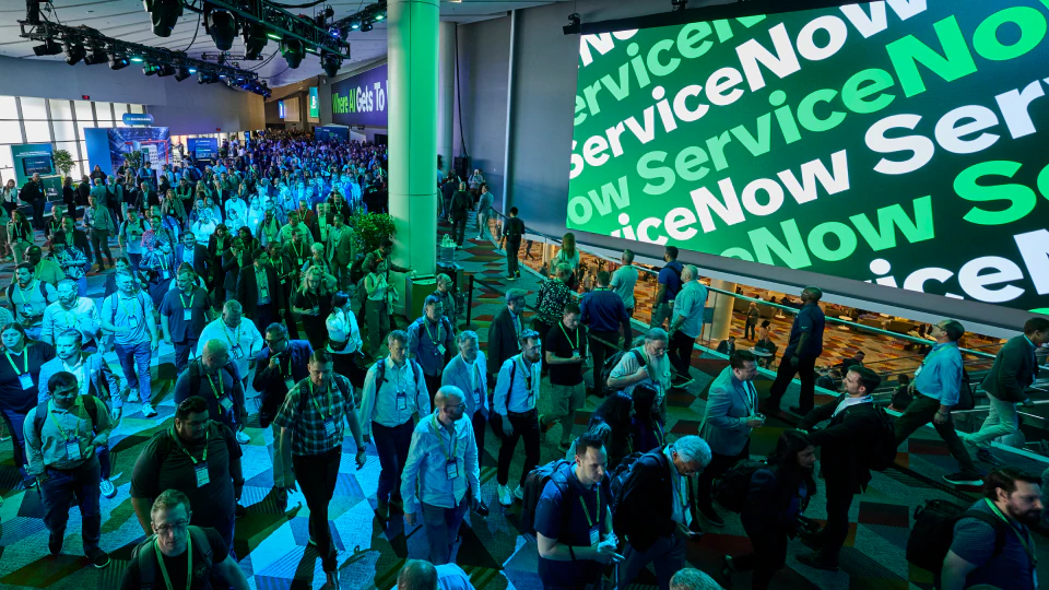 Stack of finance and investment books for wealth-building in 2026.