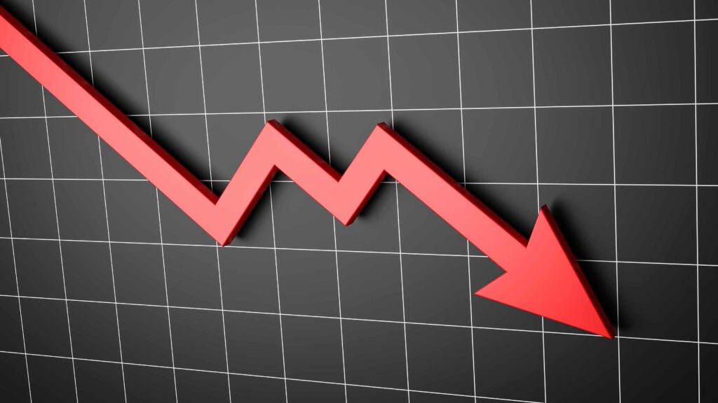 Red downward arrow on stock chart showing top losers November 9 2025